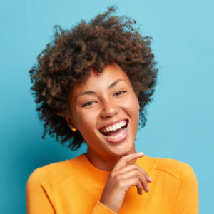 portrait of glad young afro american woman laughs 2021 08 31 09 15 33 utc 1 1